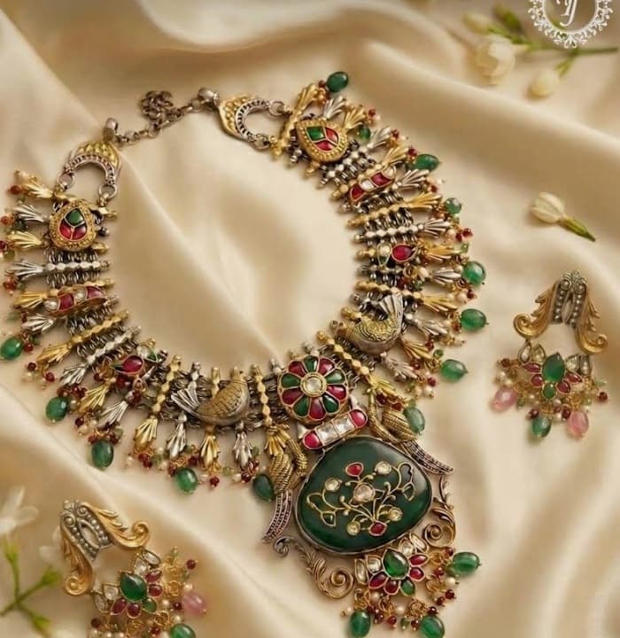 Antique 22K temple jewellery choker with Lakshmi motif and dangling ruby cabochons