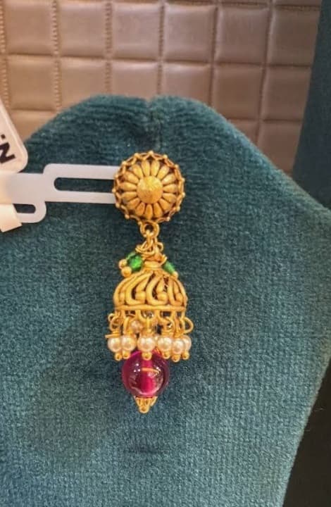 Regal antique Jadau jhumkas with uncut diamonds and south sea pearls